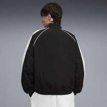 PUMA Jacke 'T7' in Schwarz