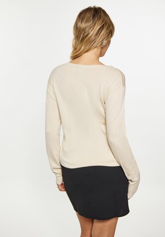 Pullover di faina in beige