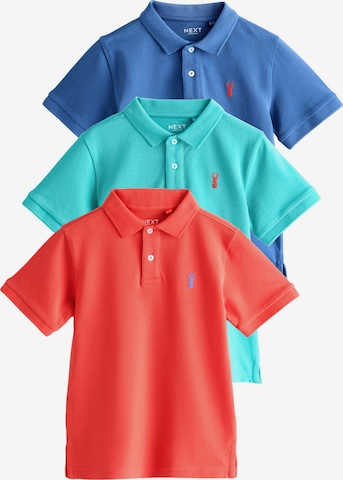 Next T-shirt i blå: framsida