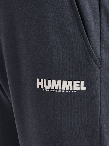 Hummel Tapered Sports trousers in Blue