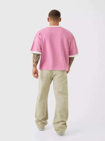 Maillot 'UNICORN Oversized Knitted Boxy Football Polo S M L XL' UNICORN en rose