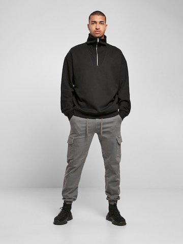 Urban Classics Sweatshirt i svart