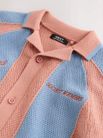 Next Neuletakki värissä sininen