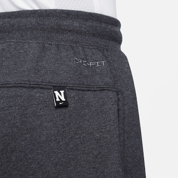 NIKE Regular Workout Pants in Grey