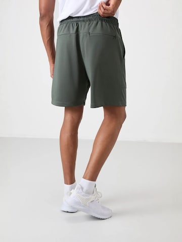 Regular Pantalon de sport Tommy Life en vert