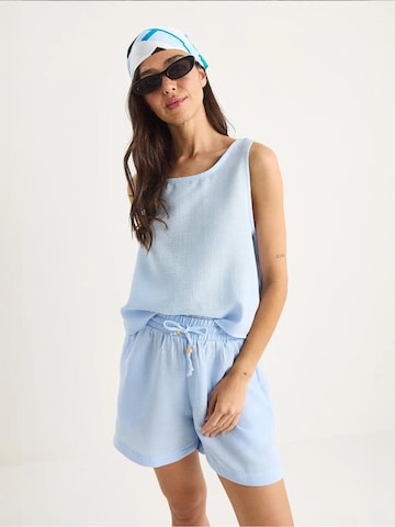 Pantalons de tailleur Bianco Lucci en bleu : devant