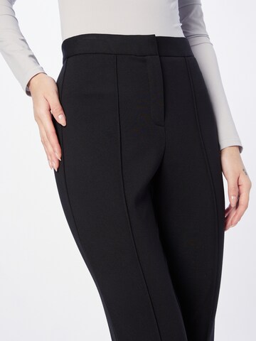 DKNY Skinny Hose in Schwarz