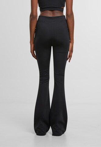 Karl Kani Flared Trousers in Black