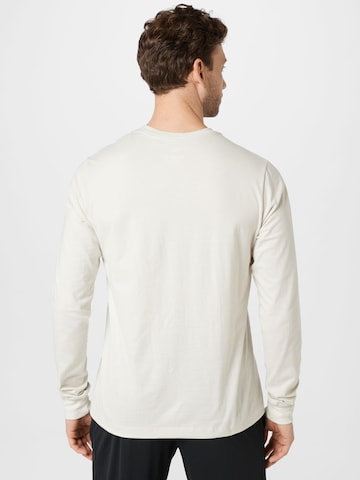 T-Shirt 'Club' Nike Sportswear en beige