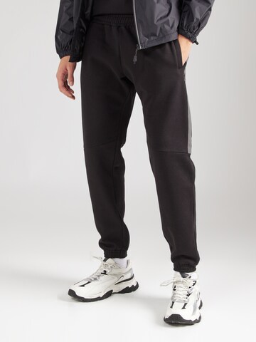 Tapered Pantaloni 'Naisi' de la ELLESSE pe negru: față