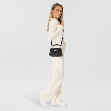 Borsa a mano 'Melisandra' di GUESS in nero