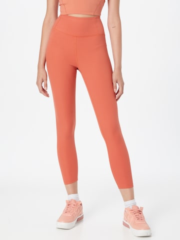 Girlfriend Collective Slimfit Sportbroek in Oranje: voorkant