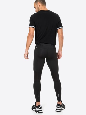 Skinny Pantaloni sportivi di PUMA in nero