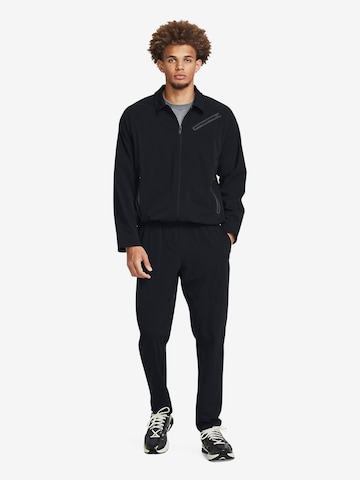 UNDER ARMOUR - Tapered Calças de desporto 'Unstoppable' em preto