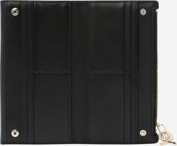 Porte-monnaies TOMMY HILFIGER en noir