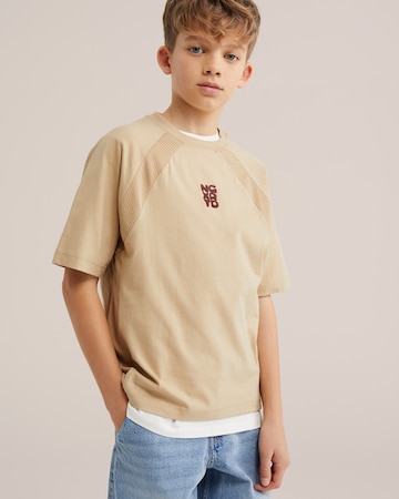 Tricou de la WE Fashion pe bej: față