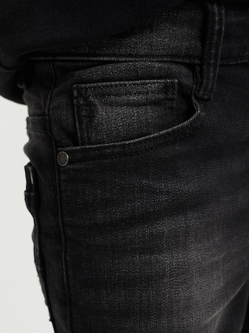 Skinny Jeans di WE Fashion in nero