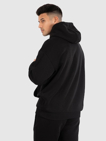 Veste de survêtement 'Rami' Smilodox en noir