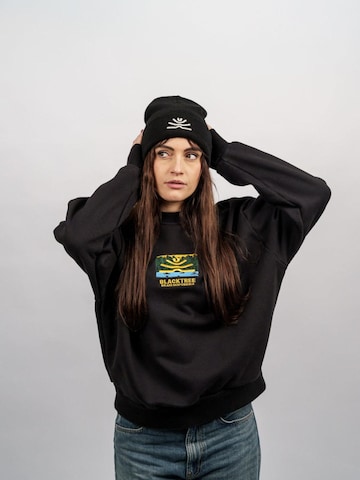 Black Tree Mütze 'ROOTS BEANIE – Made in Germany | Nachhaltig'‌‌‌ in Schwarz: Vorderseite