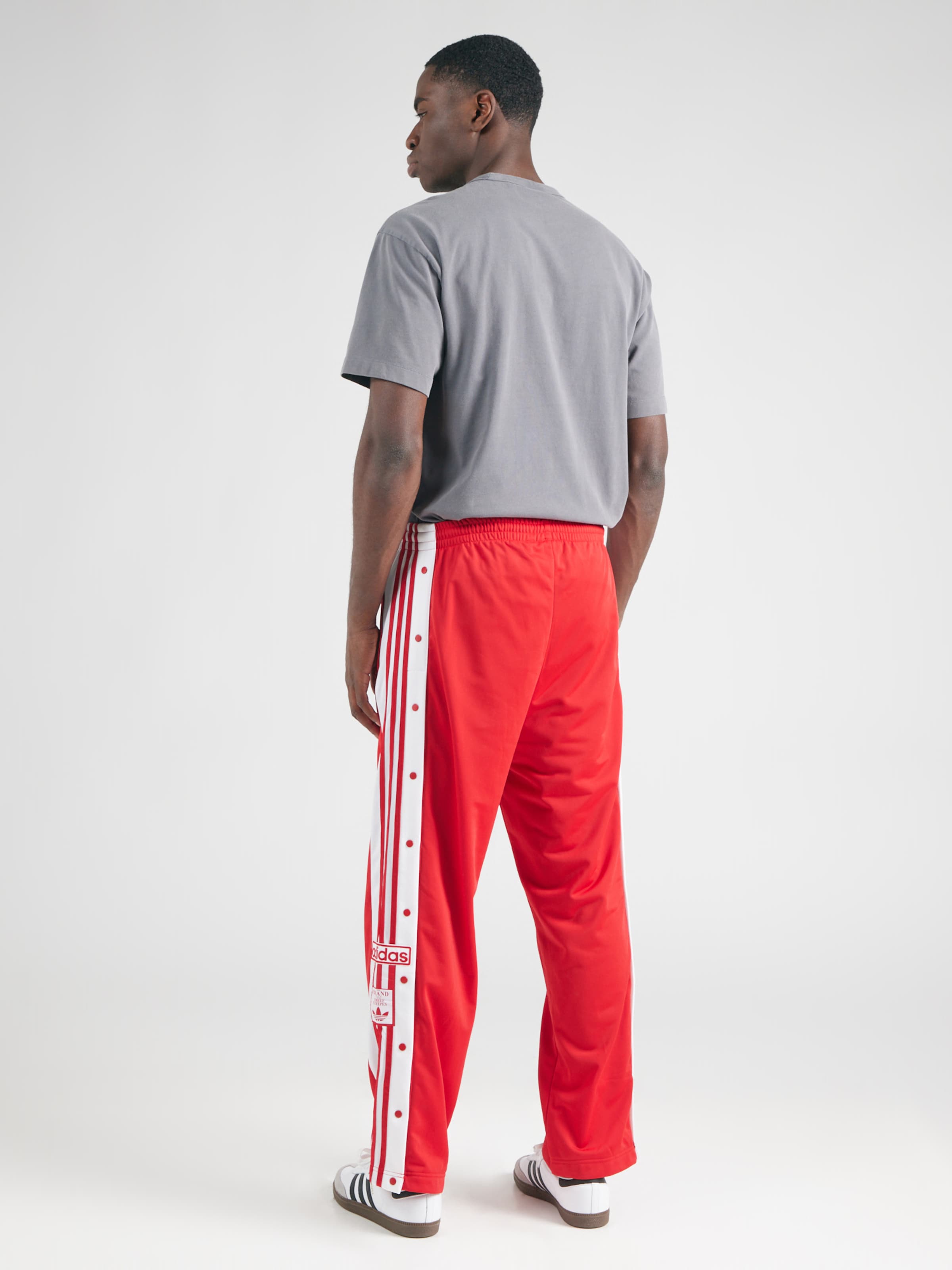ADIDAS ORIGINALS Loose fit Pants 'Adibreak' in Red | ABOUT YOU