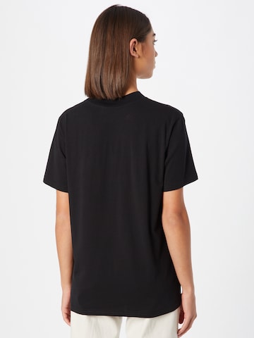Rotholz T-Shirt in Schwarz