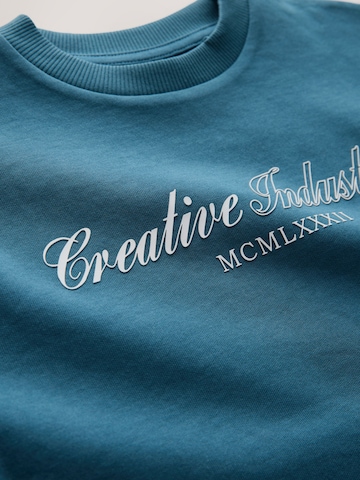 Next T-Shirt in Blau