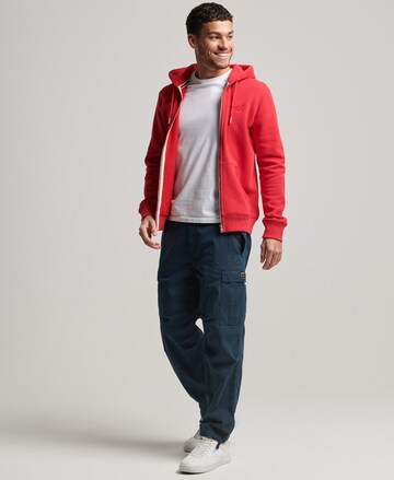 Veste de survêtement 'Essential' Superdry en rouge