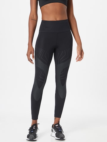 Skinny Pantalon de sport ASICS en noir : devant