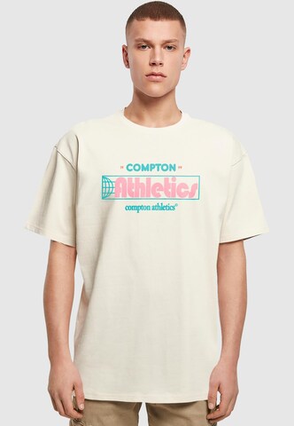 T-Shirt 'Compton Athletic Club' MT Upscale en beige : devant