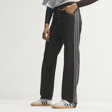 juoda ADIDAS ORIGINALS Standartinis Džinsai 'Firebird': priekis