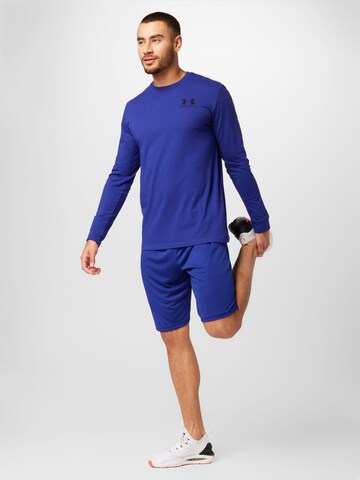 Loosefit Pantalon de sport UNDER ARMOUR en bleu