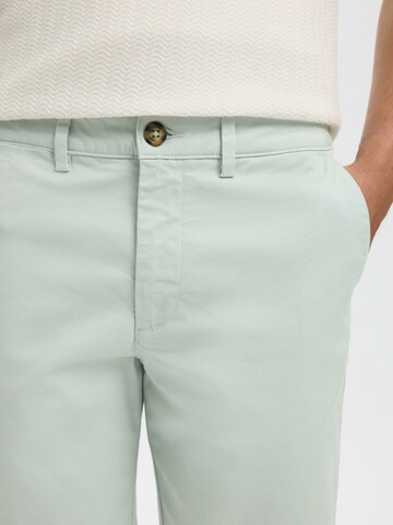 Coupe slim Pantalon chino 'SLHMILES' SELECTED en bleu