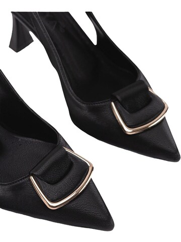 Décolleté sling 'Sanny' di Limoya in nero