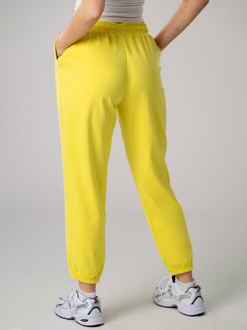 PANTONECLO Regular Trousers 'Pantoneclo Women's Trousers' in Yellow