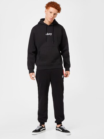 Sweat-shirt Obey en noir
