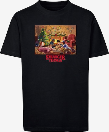 ABSOLUTE CULT T-Shirt 'Stranger Things - Christmas Gathering' in Schwarz: Vorderseite