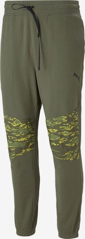 PUMA Tapered Sportbroek in Groen: voorkant