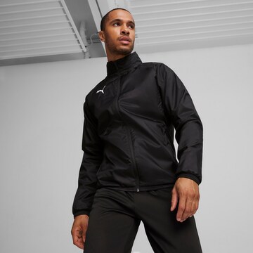 PUMA Performance Jacket 'teamGOAL' in Black: front