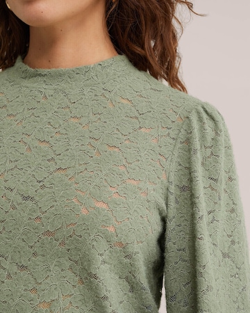 Bluză de la WE Fashion pe verde