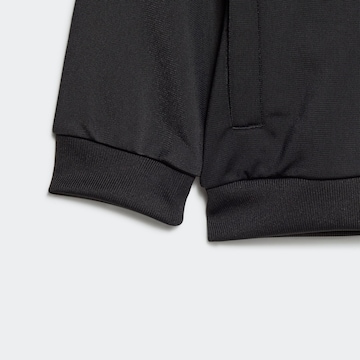 ADIDAS ORIGINALS Sweatsuit 'Rekive' in Black