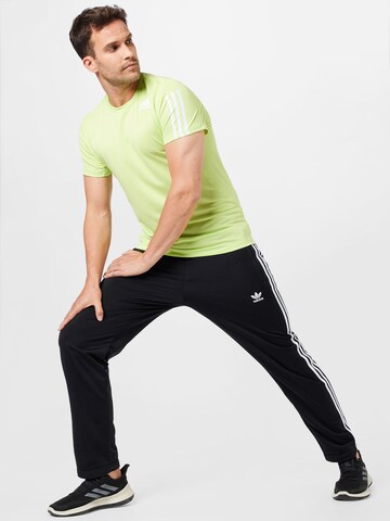 Regular Pantalon de sport 'Tiro Essential' ADIDAS SPORTSWEAR en noir