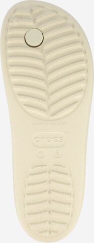 Flip-flops de la Crocs pe bej