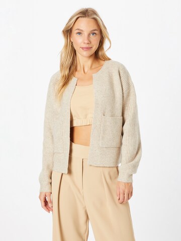 Cartoon Knit Cardigan in Beige: front