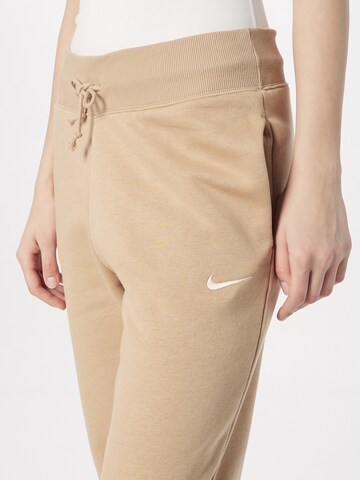 Nike Sportswear Дънки Tapered Leg Панталон в бежово