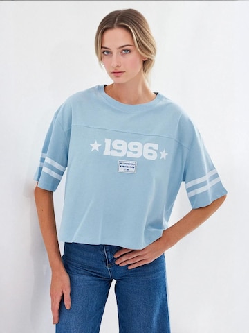 Bigdart - Camisa em azul: frente