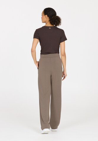 Athlecia Loose fit Sports trousers 'Jacey' in Brown