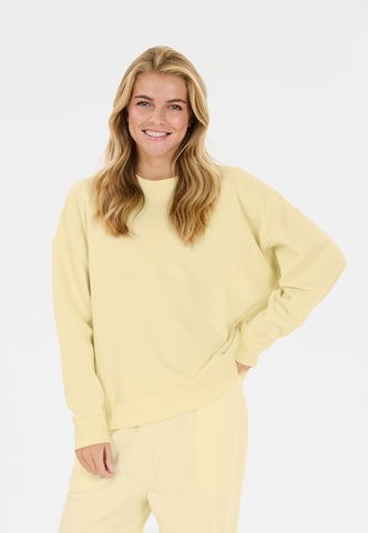 Athlecia Sweatshirt 'Crecy' in Yellow: front