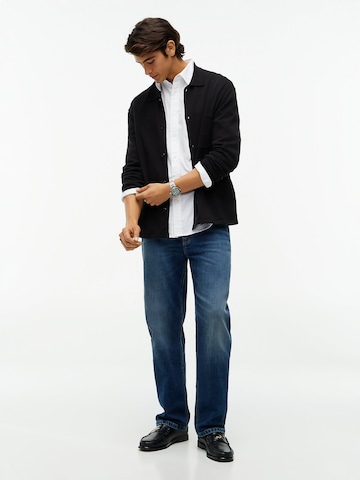 Vestes en maille TOMMY HILFIGER en noir