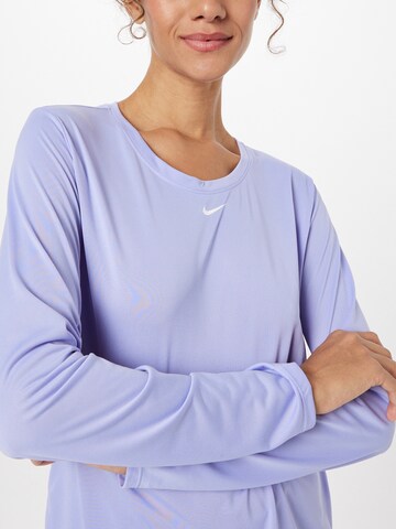 T-shirt fonctionnel 'One' NIKE en violet