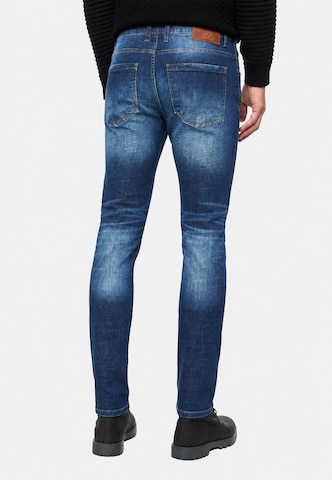 Coupe slim Jean Rusty Neal en bleu
